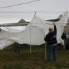 Tent installation on a windy day